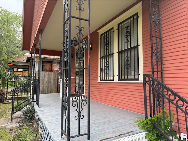 512 Threlkeld St, Houston, TX 77007 - wooden deck with a porch