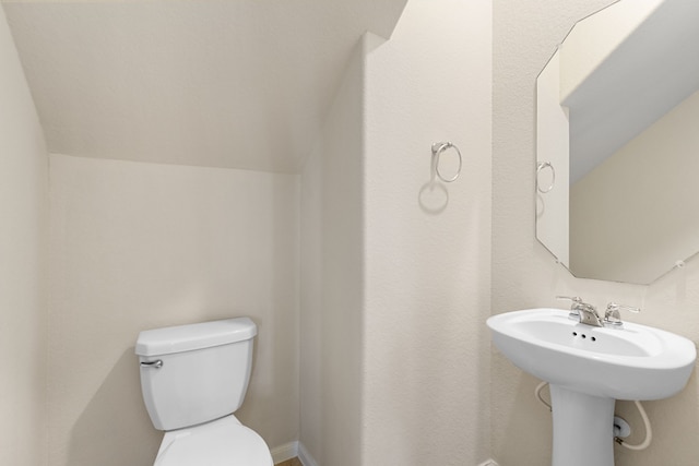 bathroom featuring toilet