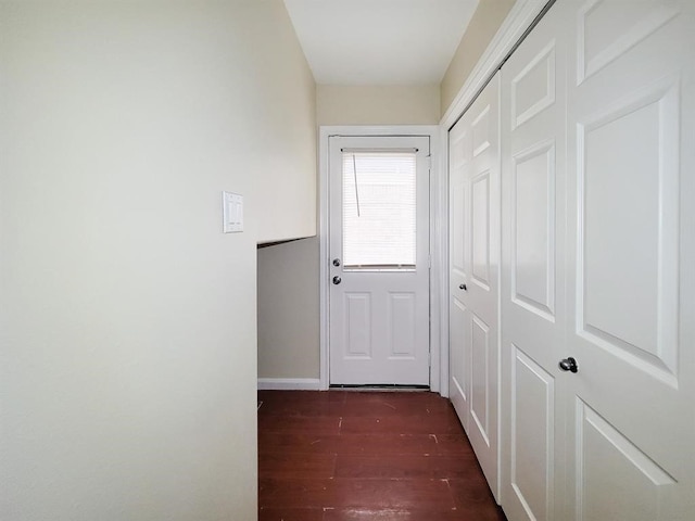 hallway featuring dark hardwood / wood-style floors