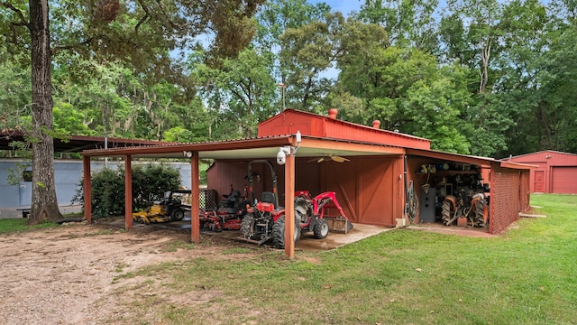 view of outbuilding featuring a lawn