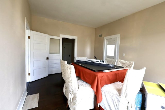 interior space with dark wood-type flooring