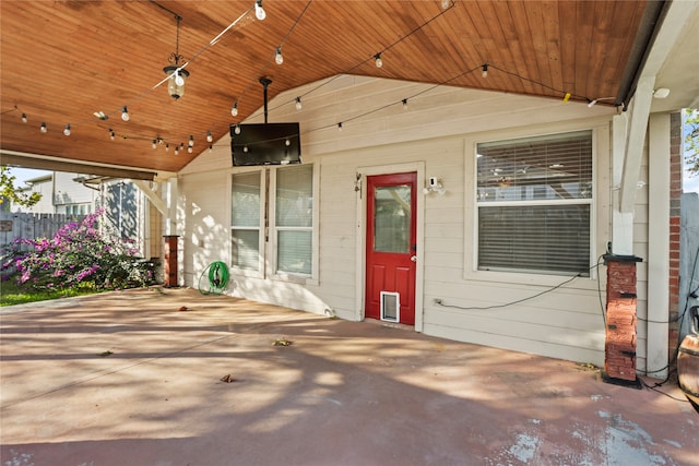 property entrance featuring a patio area