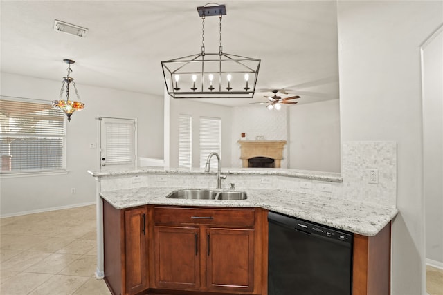 kitchen with ceiling fan, sink, decorative light fixtures, and black dishwasher