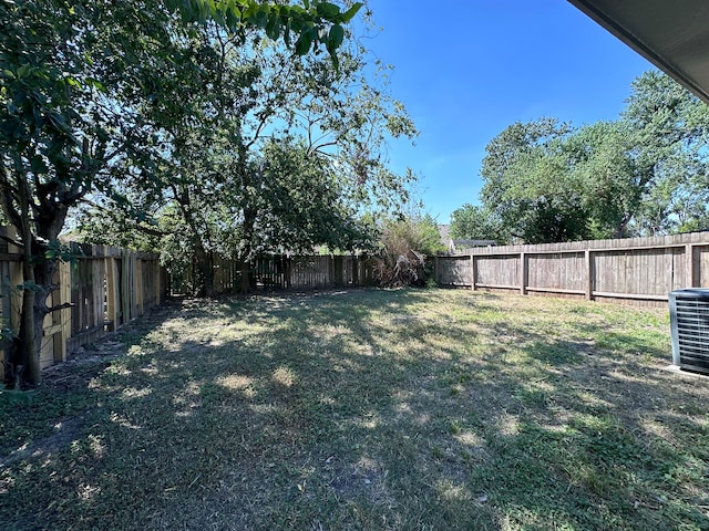 view of yard featuring central AC unit