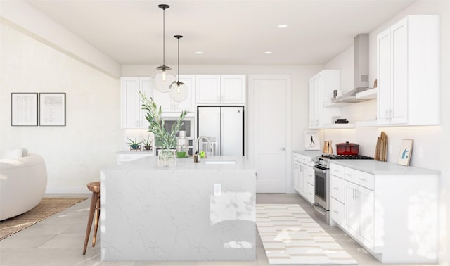 kitchen with white cabinetry, high end stainless steel range, white fridge with ice dispenser, and wall chimney exhaust hood