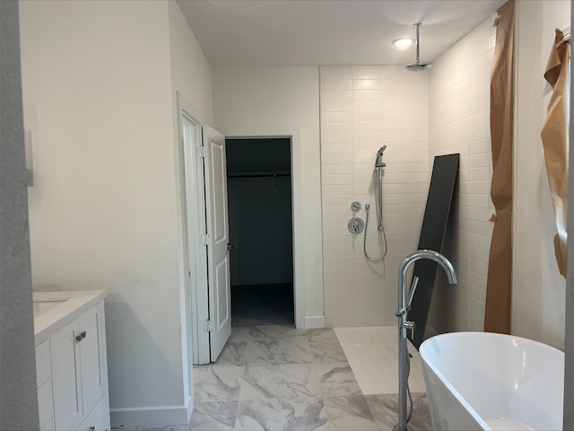 bathroom with vanity and independent shower and bath