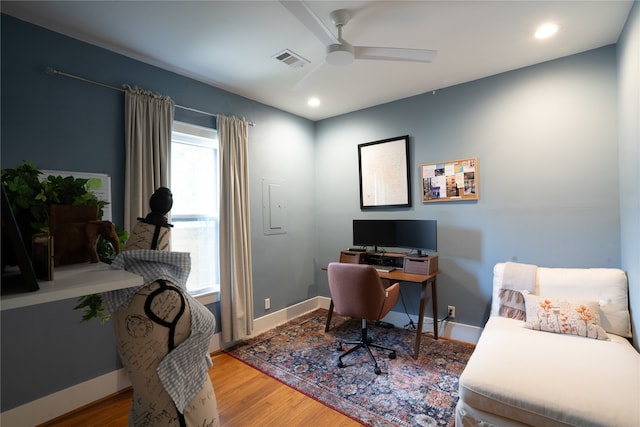 office area with hardwood / wood-style floors and ceiling fan