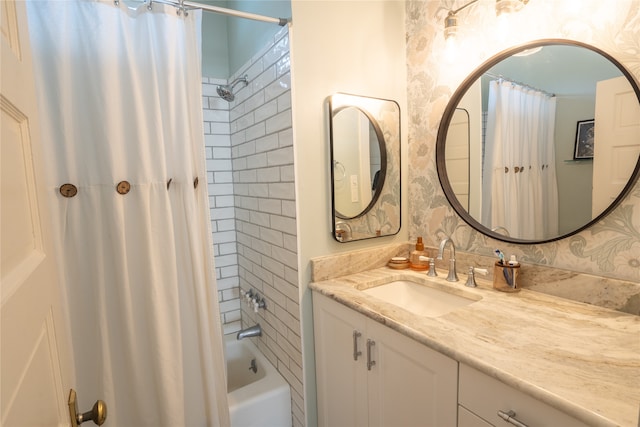 bathroom featuring vanity and shower / bath combo with shower curtain