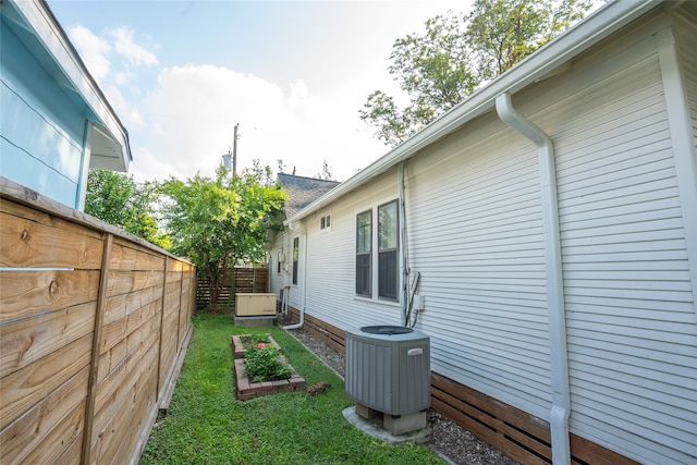 view of side of property featuring cooling unit