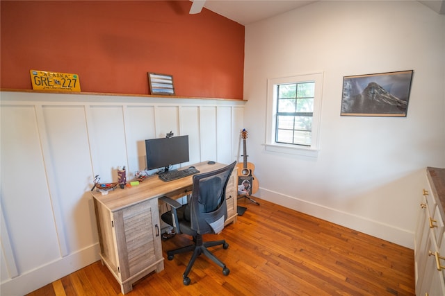 office area with light hardwood / wood-style flooring