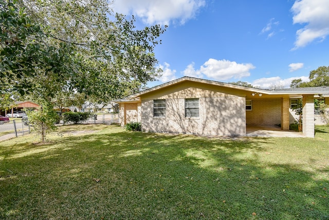 view of home's exterior with a lawn