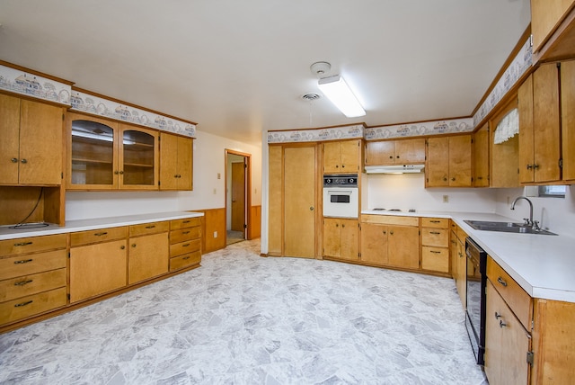 kitchen with white appliances, wine cooler, and sink