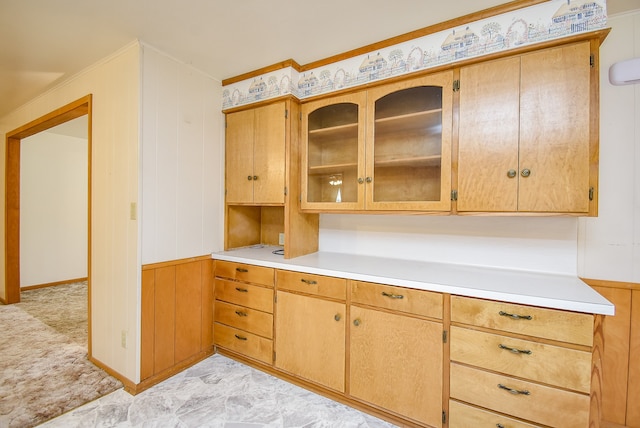 kitchen featuring wooden walls