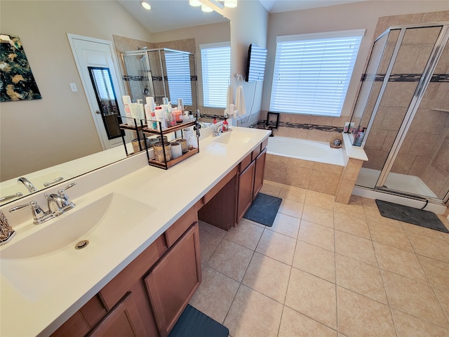 bathroom featuring tile patterned floors, vanity, and independent shower and bath