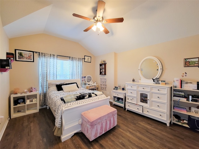 bedroom featuring dark hardwood / wood-style floors, ceiling fan, and lofted ceiling