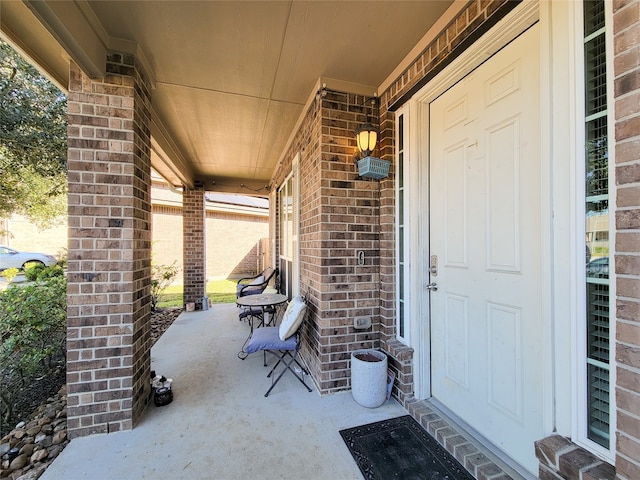 doorway to property with covered porch