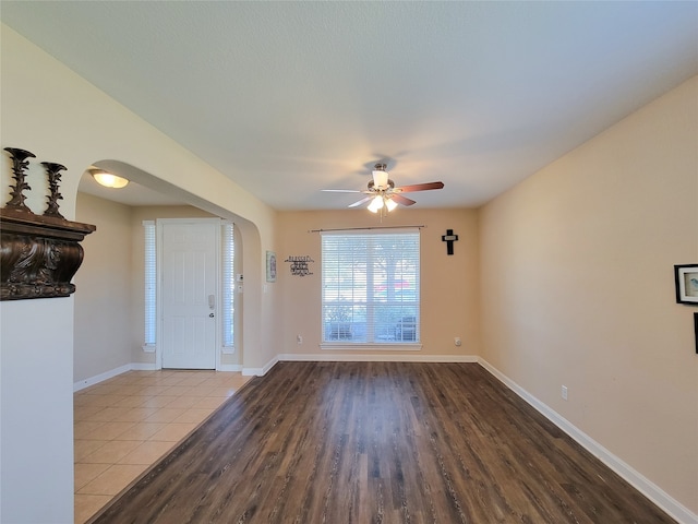 interior space with ceiling fan and hardwood / wood-style flooring