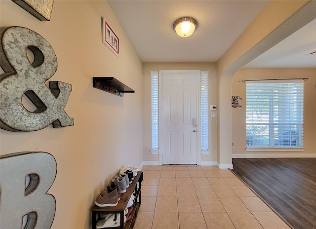 foyer with light wood-type flooring