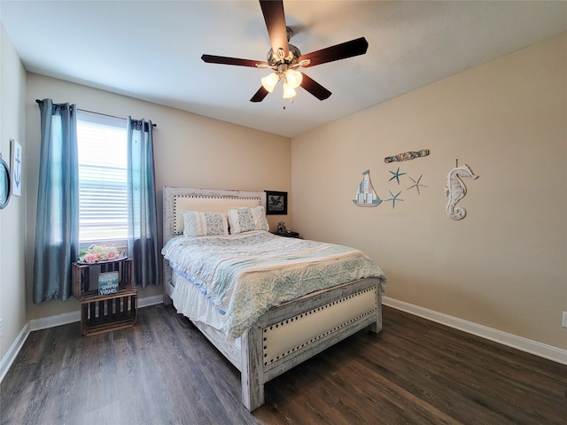 bedroom featuring ceiling fan and dark wood-type flooring