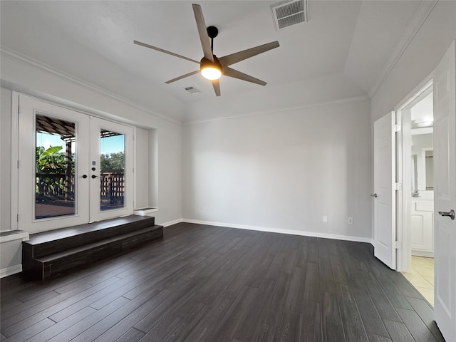 unfurnished room with french doors, dark hardwood / wood-style flooring, vaulted ceiling, and ceiling fan