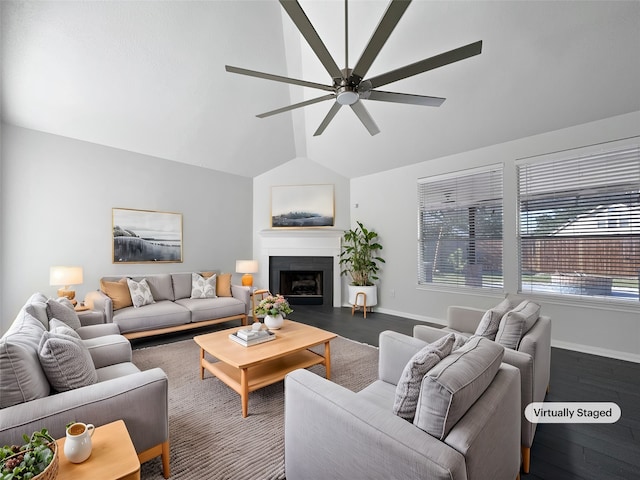 living room with dark hardwood / wood-style flooring, vaulted ceiling, and ceiling fan