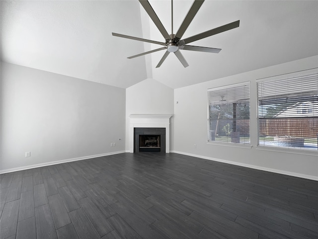 unfurnished living room featuring ceiling fan, dark wood-type flooring, and vaulted ceiling