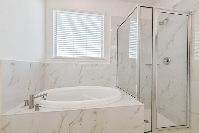 16334 Placid Stream St, Conroe, TX 77302 - bathroom featuring a garden tub and a marble finish shower