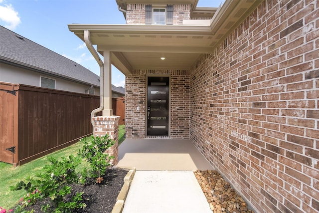 16334 Placid Stream St, Conroe, TX 77302 - doorway to property featuring brick siding and fence