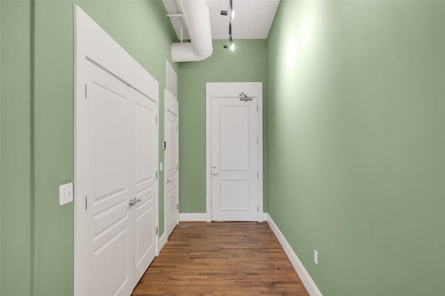 hallway featuring hardwood / wood-style floors