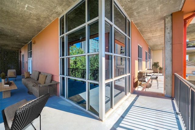 balcony with an outdoor hangout area