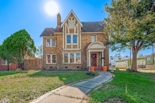 view of front of home with a front yard