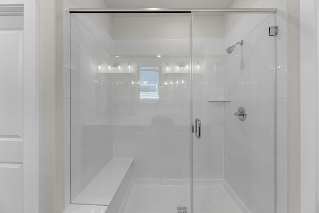 bathroom with an enclosed shower