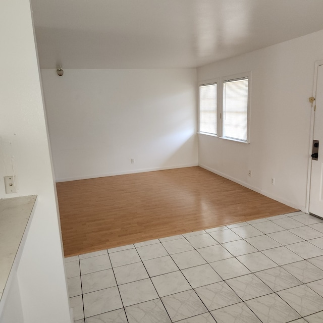 unfurnished room featuring light hardwood / wood-style floors