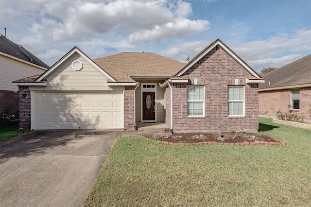 view of front facade featuring a garage and a front lawn