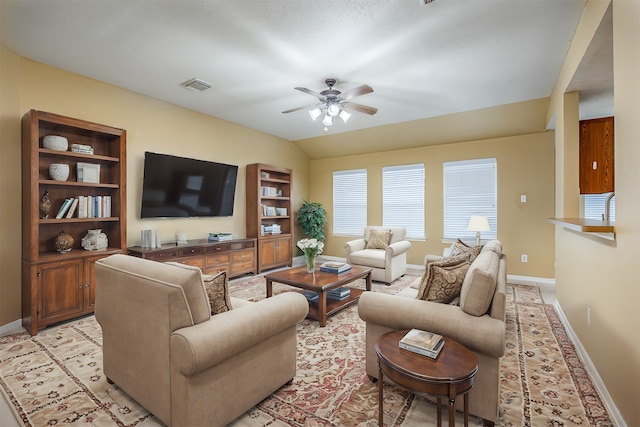 living room featuring ceiling fan