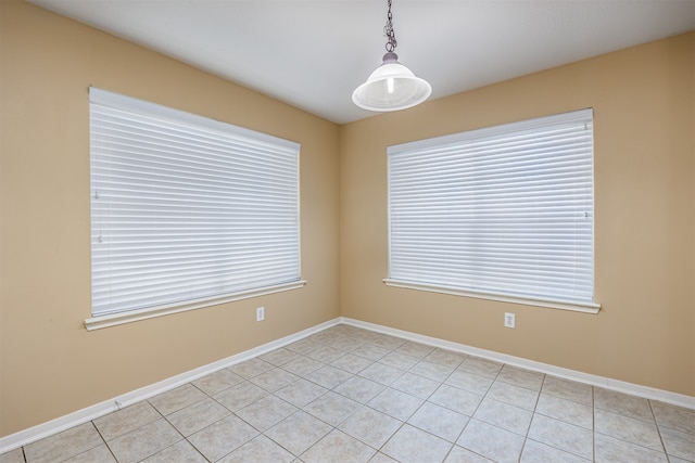 view of tiled spare room