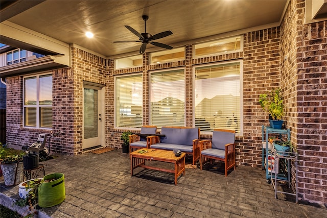 view of patio with outdoor lounge area and ceiling fan