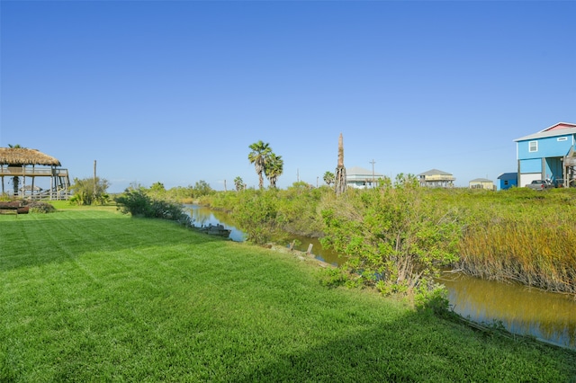 view of yard with a water view