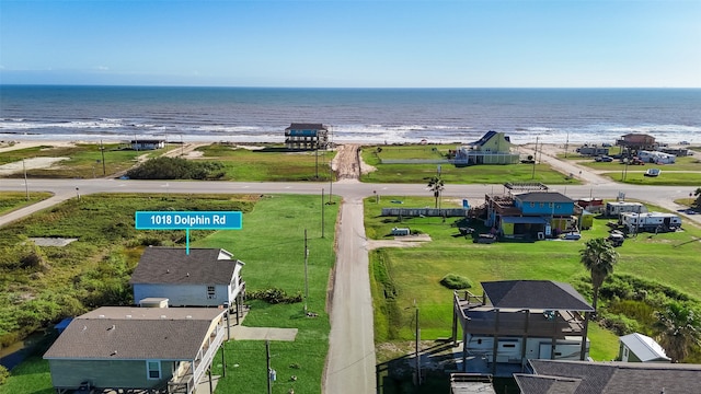 aerial view featuring a water view and a view of the beach