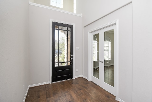 entrance foyer featuring dark wood-type flooring and french doors