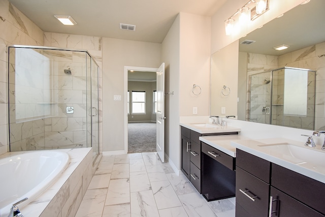 bathroom featuring plus walk in shower and vanity