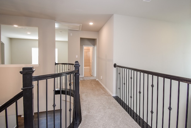 corridor featuring carpet floors