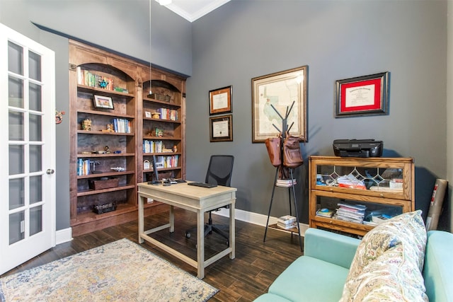 office space with dark hardwood / wood-style flooring and ornamental molding