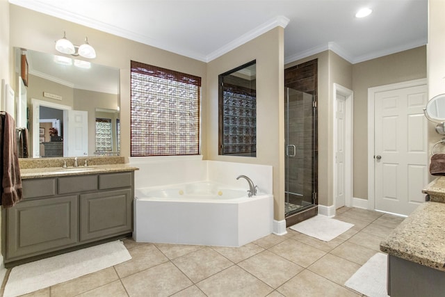 bathroom featuring crown molding, separate shower and tub, tile patterned floors, and vanity