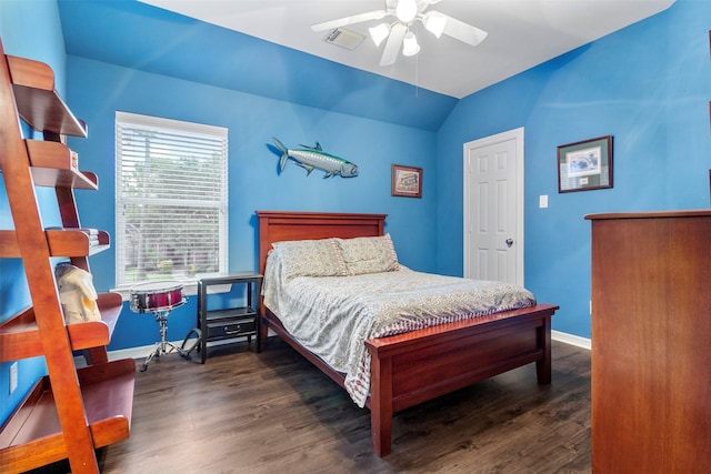 bedroom featuring ceiling fan, lofted ceiling, and dark hardwood / wood-style floors