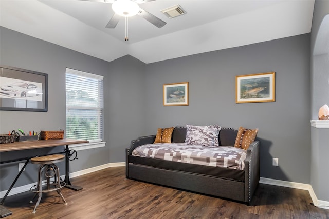 interior space featuring ceiling fan and dark hardwood / wood-style floors