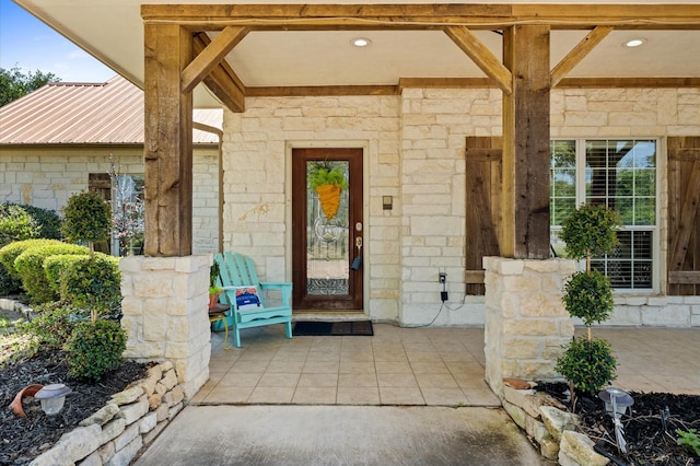 5960HIGHWAY 36 N, Bellville, TX 77418 - view of exterior entry featuring stone siding and metal roof