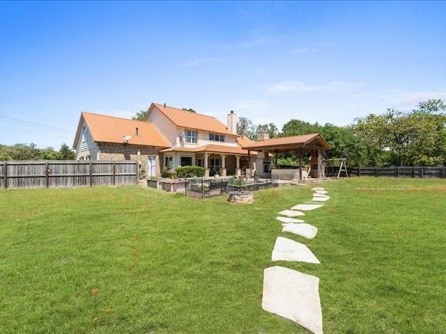 5960HIGHWAY 36 N, Bellville, TX 77418 - back of property featuring a lawn, a fenced backyard, and a patio