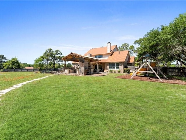 5960HIGHWAY 36 N, Bellville, TX 77418 - back of property with fence, a chimney, a yard, and a playground
