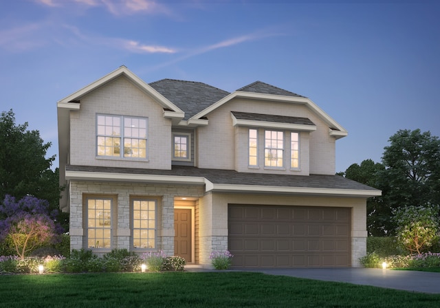 view of front of home with a garage